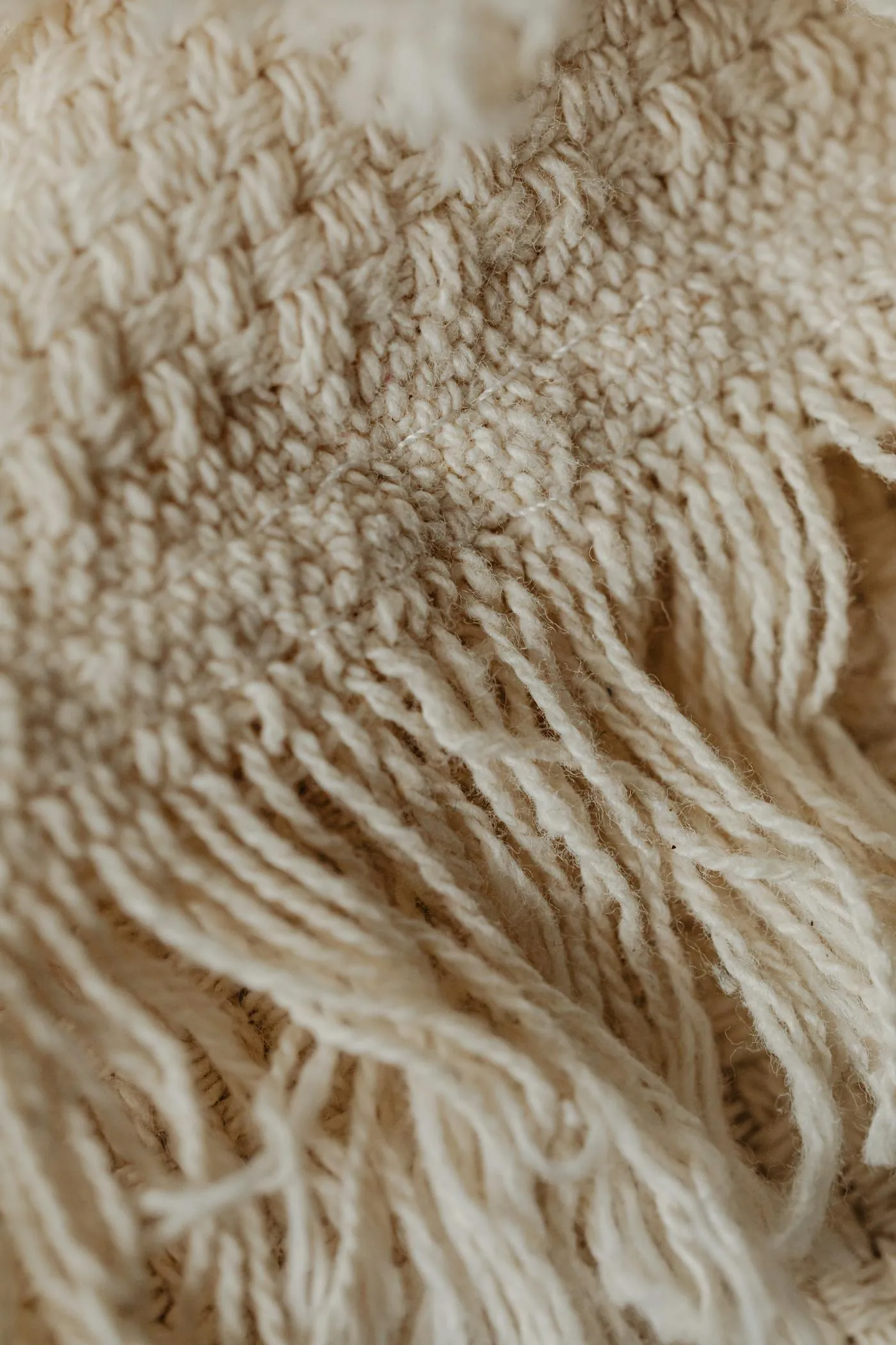 Detalle de fleco de algodón peinado